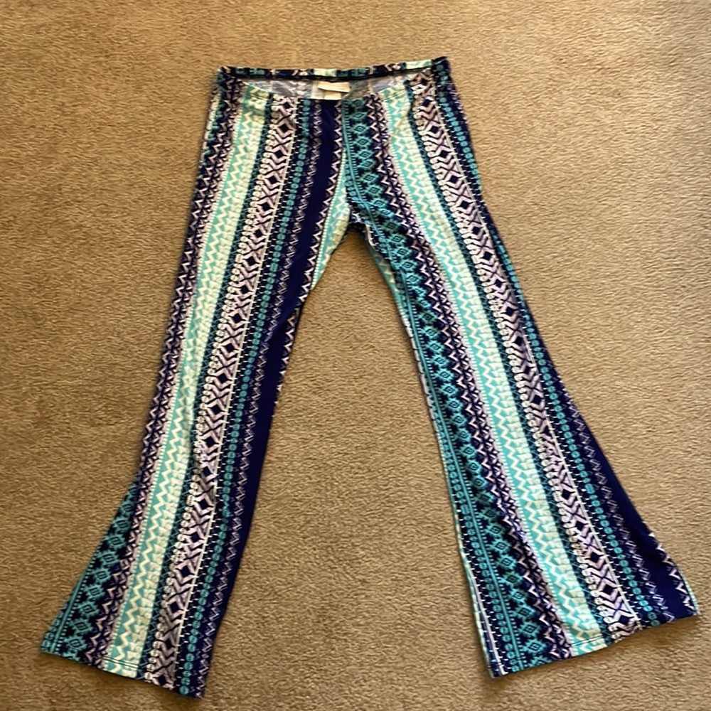 Self esteem youth large patterned multicolored bell bottom leggings.